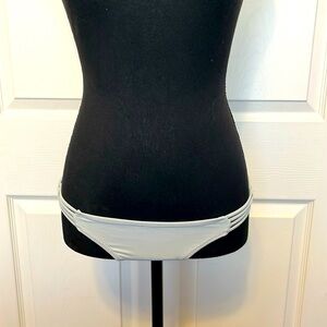 NWT-Sexy swim bottom. Juniors size one in grey.